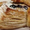 close up of the layers of a blueberry danish